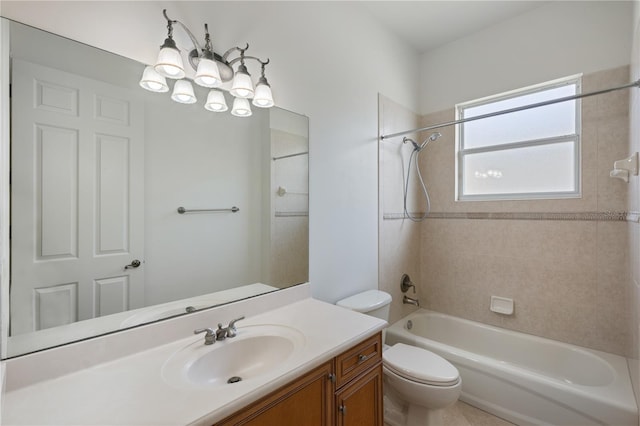 full bathroom with tiled shower / bath combo, vanity, and toilet