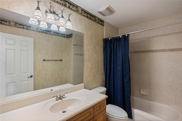 full bathroom featuring shower / bath combination with curtain, vanity, and toilet