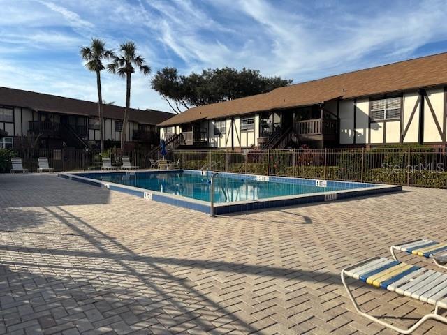 view of swimming pool featuring a patio