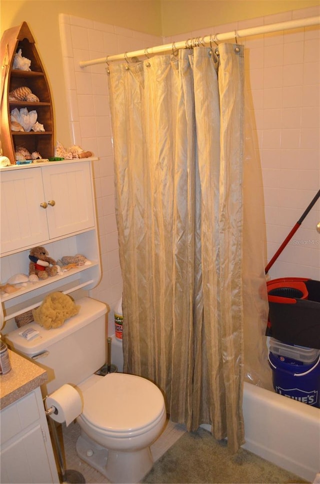 full bathroom featuring vanity, toilet, and shower / bath combo with shower curtain