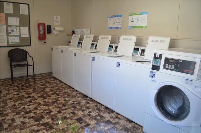 laundry room featuring washing machine and dryer