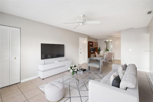 5413 Hansel Ave Unit K10, Orlando, FL 32809 - living area featuring a ceiling fan and light tile patterned floors