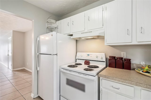 5413 Hansel Ave Unit K10, Orlando, FL 32809 - kitchen featuring white appliances, under cabinet range hood, light countertops, white cabinets, and light tile patterned flooring