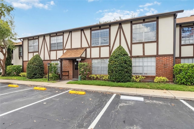 5413 Hansel Ave Unit K10, Orlando, FL 32809 - view of property featuring uncovered parking