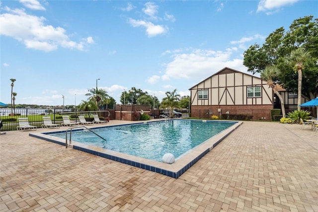 5413 Hansel Ave Unit K10, Orlando, FL 32809 - community pool featuring a patio