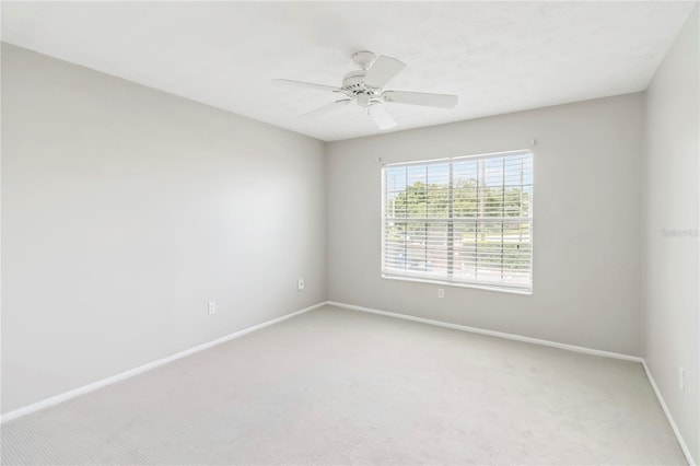 5413 Hansel Ave Unit K10, Orlando, FL 32809 - empty room with light carpet and ceiling fan