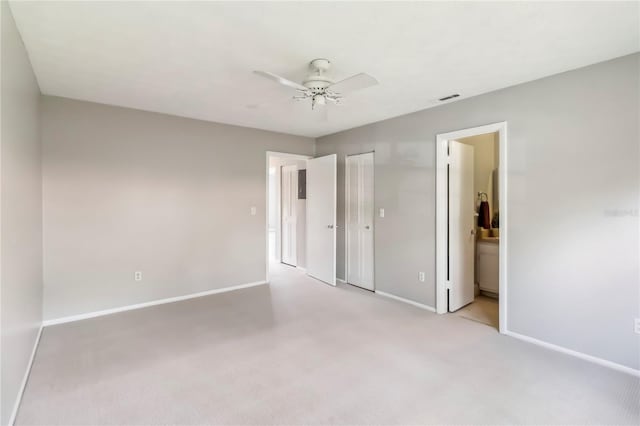 5413 Hansel Ave Unit K10, Orlando, FL 32809 - unfurnished bedroom with light colored carpet, ensuite bath, and a ceiling fan