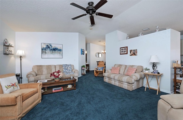 carpeted living room with ceiling fan with notable chandelier and a textured ceiling