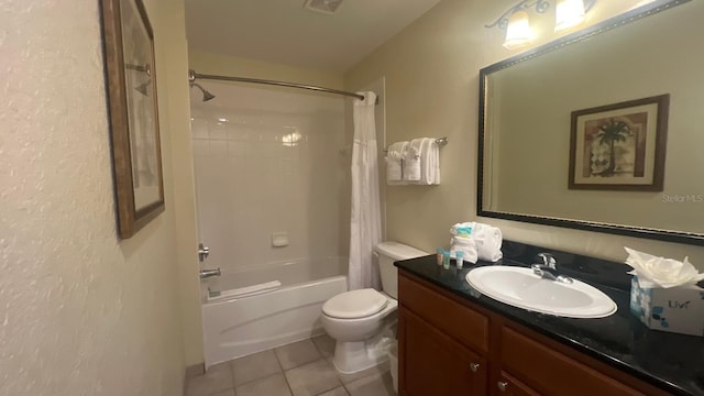 8112 Poinciana Blvd, Orlando, FL 32821 - full bath featuring shower / bath combo, visible vents, toilet, tile patterned floors, and vanity