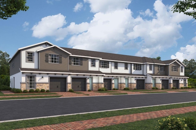 5110 Rain Shadow Dr, Saint Cloud, FL 34772 - townhome / multi-family property featuring an attached garage and stone siding