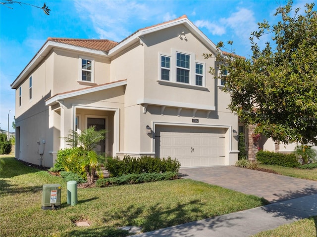 view of front facade with a garage and a front yard