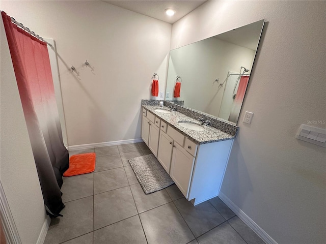 bathroom with vanity and tile patterned floors