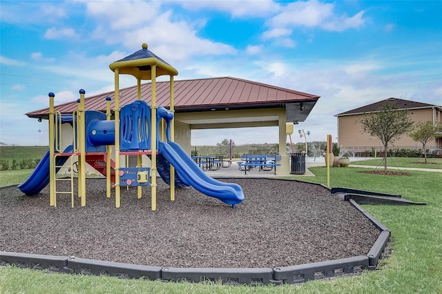 view of jungle gym with a yard