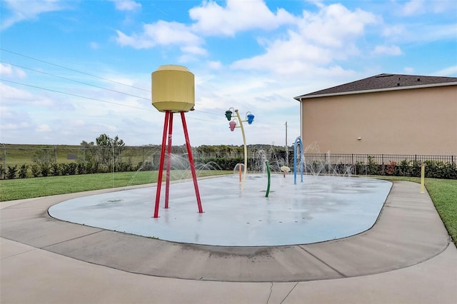 view of playground featuring a yard