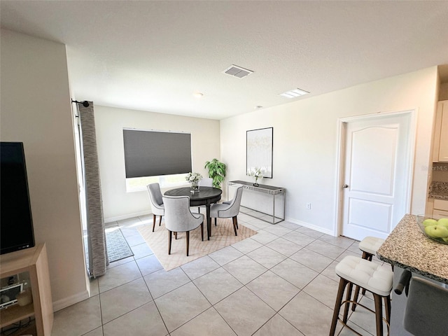 view of tiled dining area