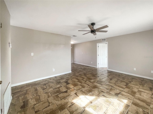 empty room featuring ceiling fan