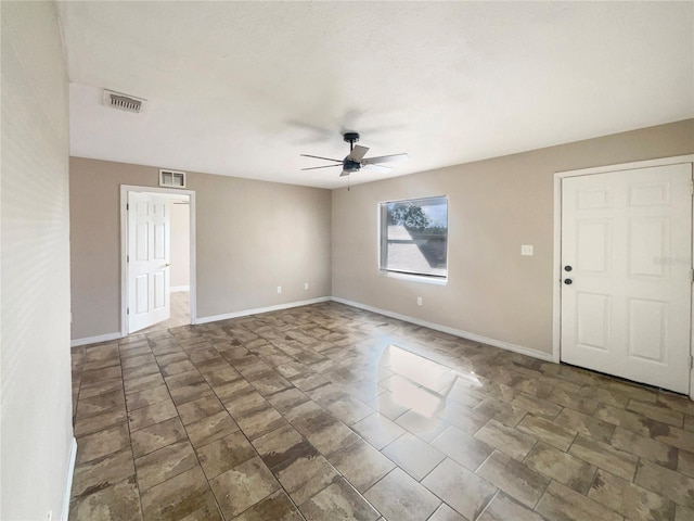 unfurnished room featuring ceiling fan