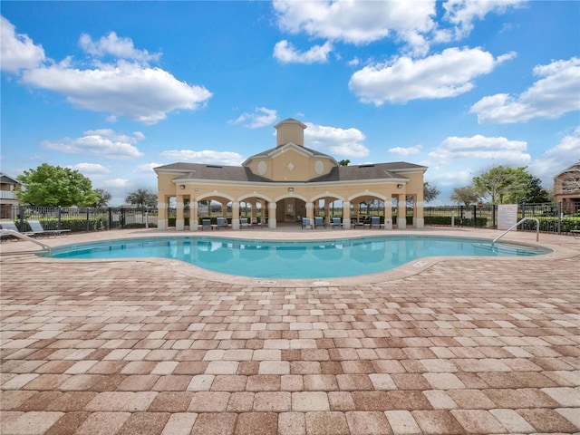 view of pool featuring a patio