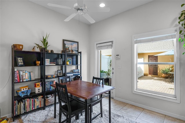 office area with ceiling fan and light tile patterned floors