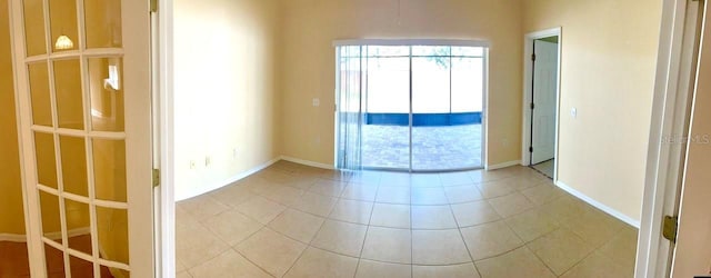 spare room featuring tile patterned floors