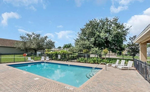 view of pool with a patio