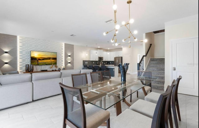 tiled dining room with a notable chandelier