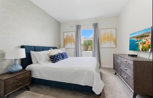 bedroom with light colored carpet