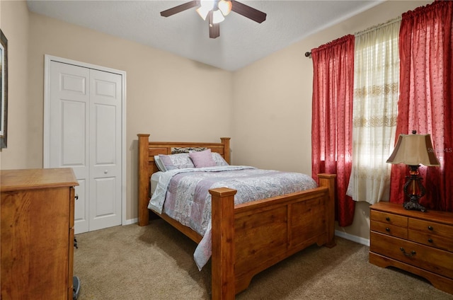 bedroom with carpet floors and ceiling fan