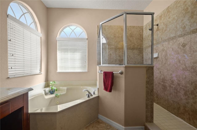 bathroom with plus walk in shower and vanity