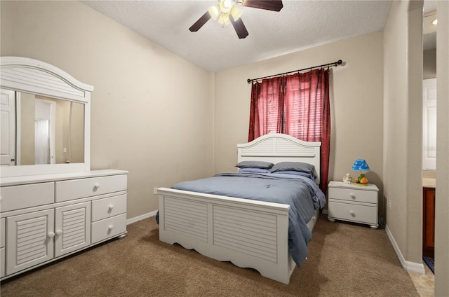 carpeted bedroom with ceiling fan, lofted ceiling, and a textured ceiling