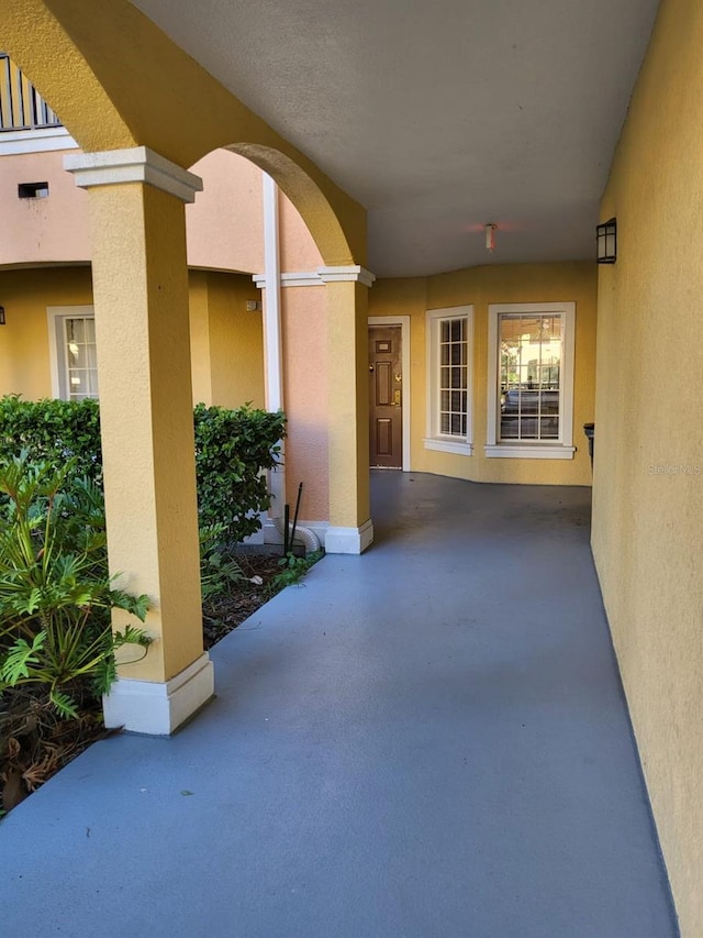 doorway to property featuring a patio area