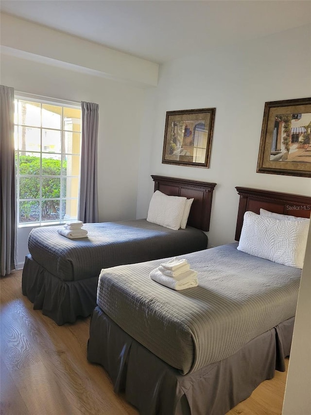 bedroom with light wood-type flooring