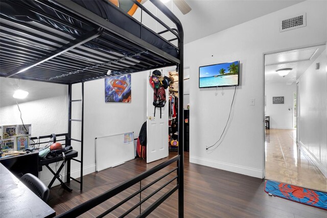 bedroom featuring dark hardwood / wood-style floors