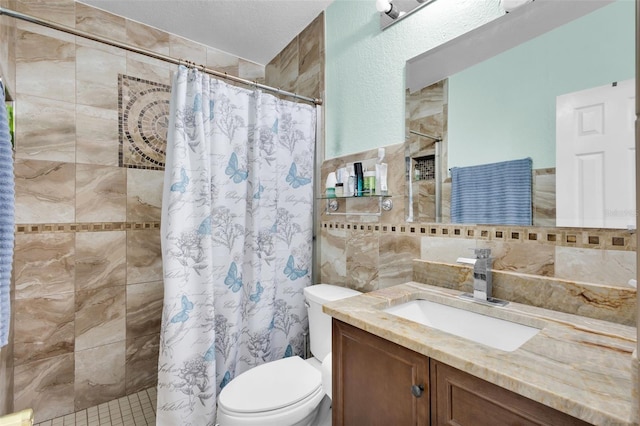 bathroom featuring curtained shower, tile walls, backsplash, vanity, and toilet