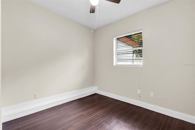 empty room with hardwood / wood-style floors and ceiling fan