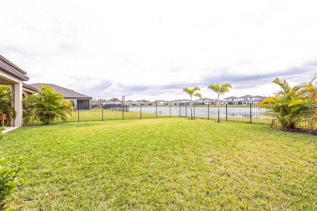 view of yard with a water view