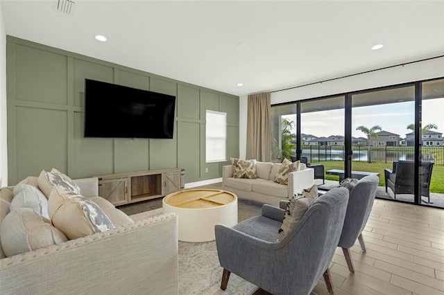 living room featuring light wood-type flooring