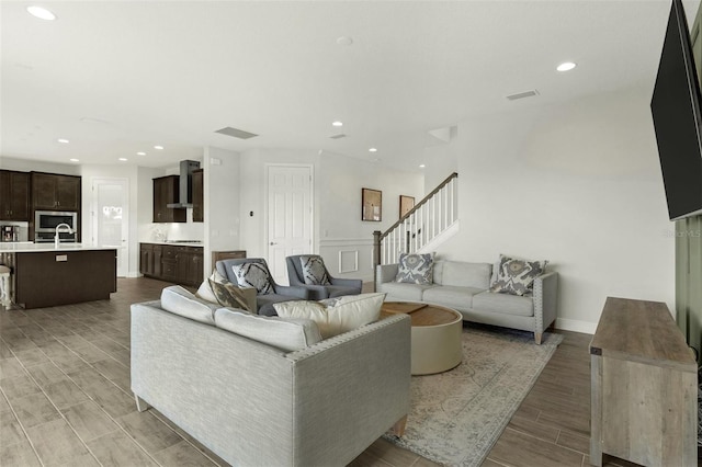 living room featuring sink