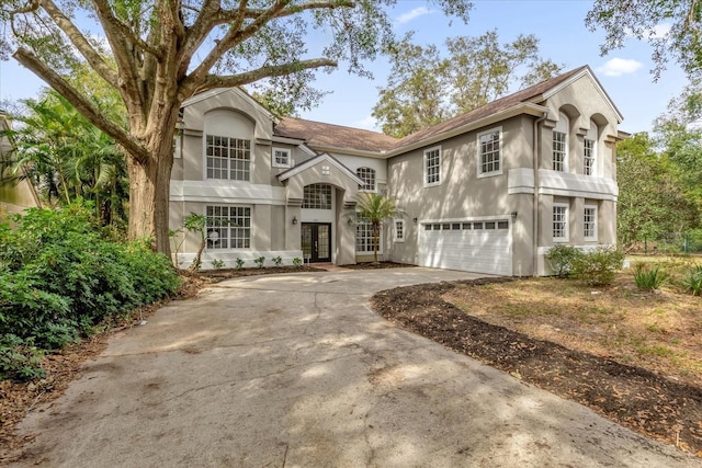 view of front of property with a garage