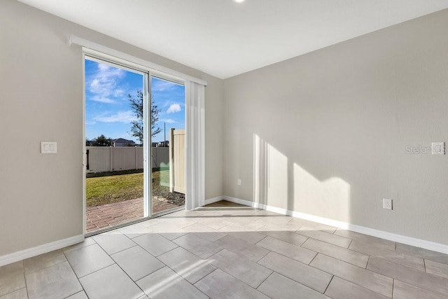 view of tiled spare room