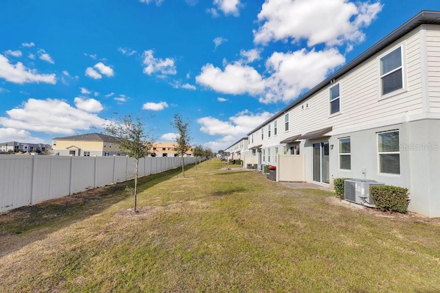 view of yard featuring central AC