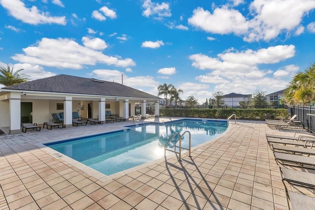 view of pool featuring a patio