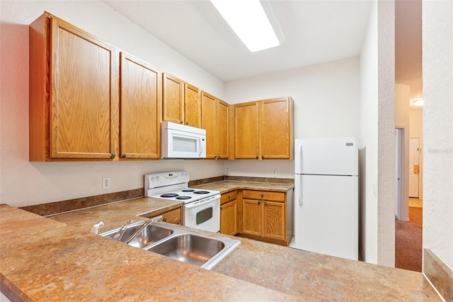 kitchen with sink and white appliances