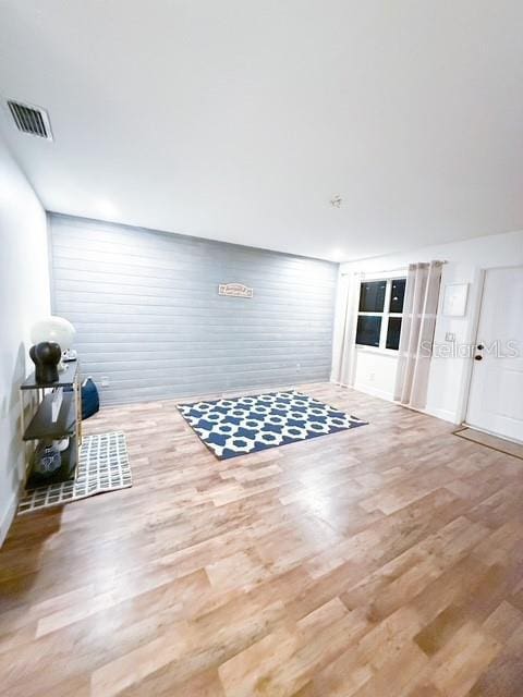 interior space with hardwood / wood-style flooring