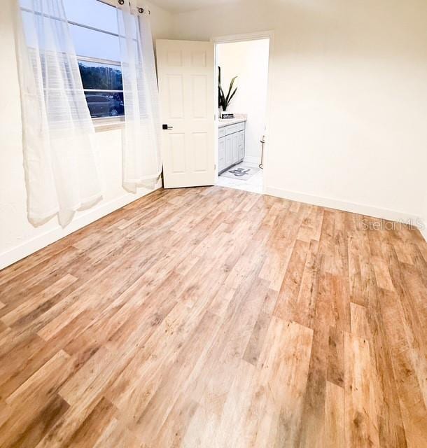 empty room featuring light hardwood / wood-style flooring