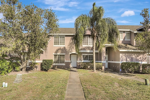 view of front facade with a front lawn