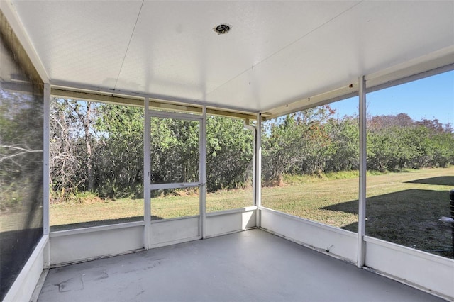 unfurnished sunroom with a wealth of natural light