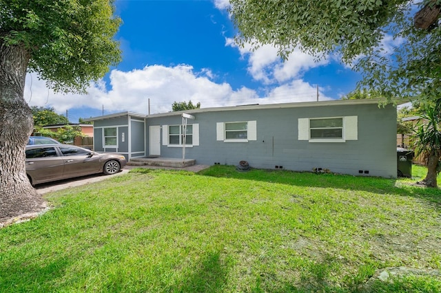 ranch-style house with a front yard