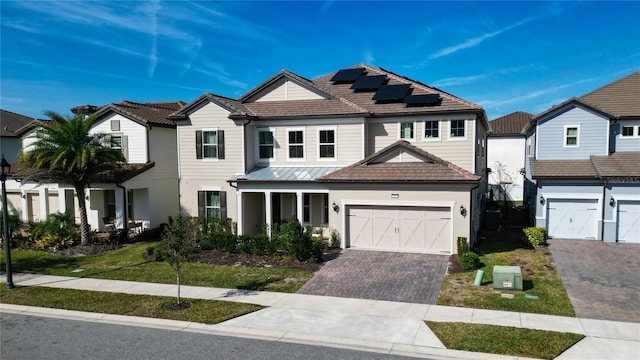 view of front of home with solar panels