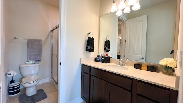 bathroom with an enclosed shower, vanity, a notable chandelier, and toilet